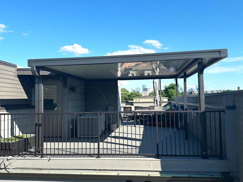 flat metal canopy on roof of building