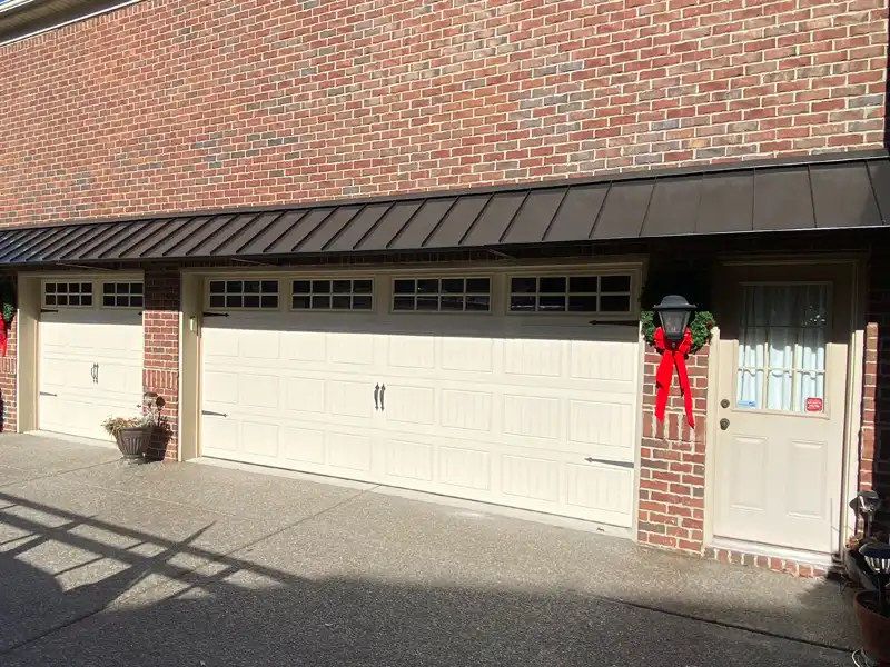 metal awning over garage doors