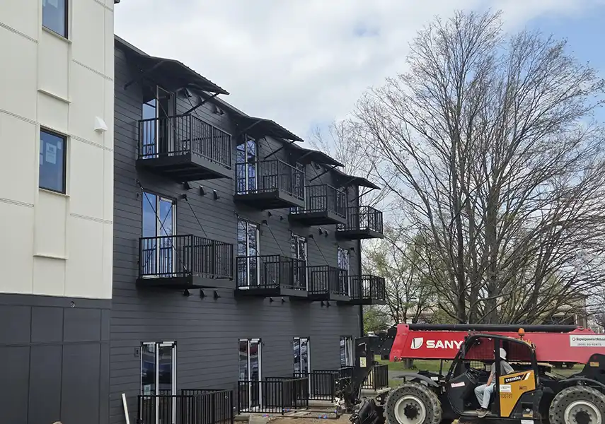 standing seam lift awnings on residential building